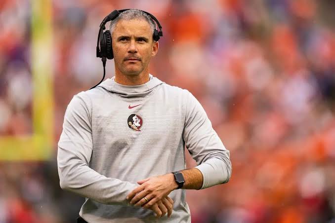 Breaking News: The head coach of Florida state Seminoles “Mike Norvell” Tragically Dies in Car Crash in…….read more….